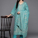 Green and beige woven design dress material